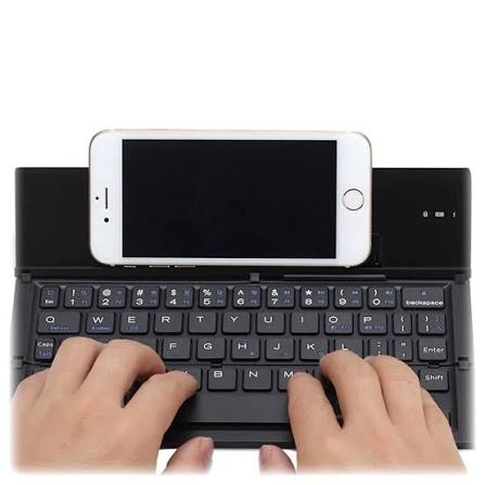 Keyboard with phone holder