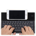 Keyboard with phone holder
